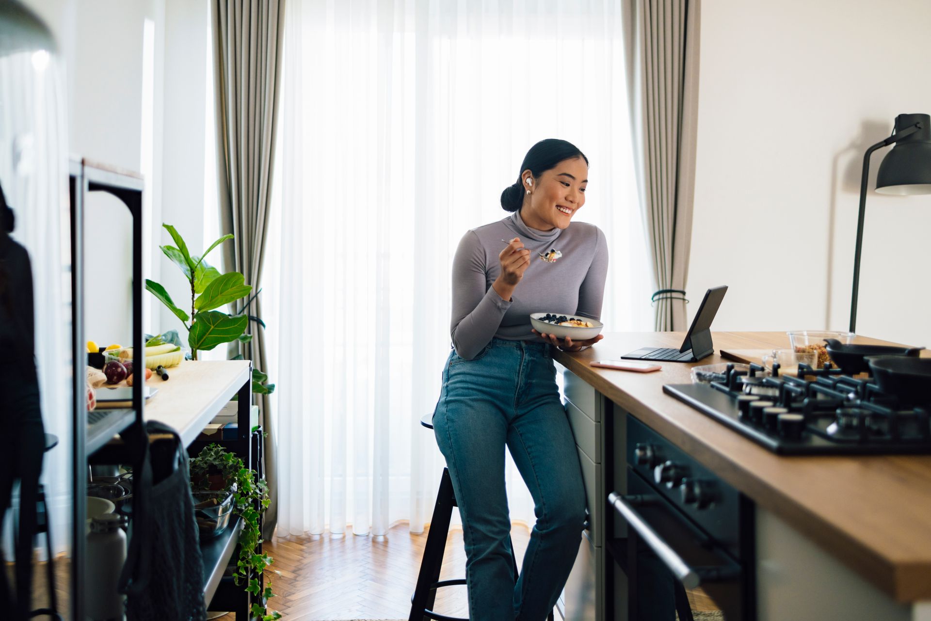 woman using digital tablet