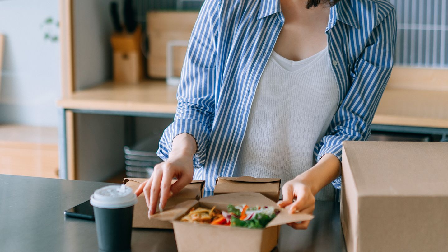 woman with takeout order